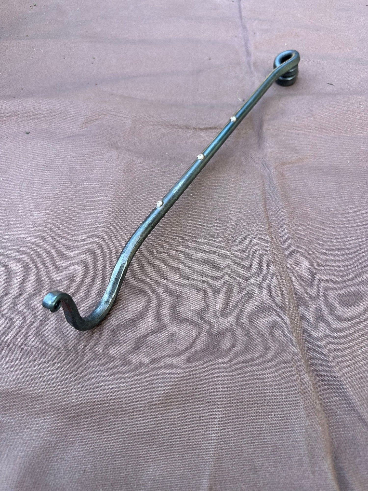 Forged hook arm 